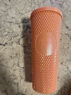 Pink studded Starbucks Cup